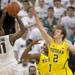 Michigan freshman Spike Albrecht guards Michigan State junior Keith Appling as he lines up a shot during the first half at Breslin Center in East Lansing on Tuesday, Feb. 12. Melanie Maxwell I AnnArbor.com